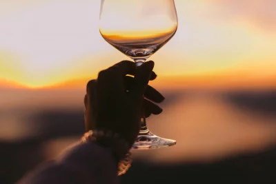 Thumbnail for Avventure private al tramonto a Santorini: Tour a piedi, degustazioni di cibi e bevande locali